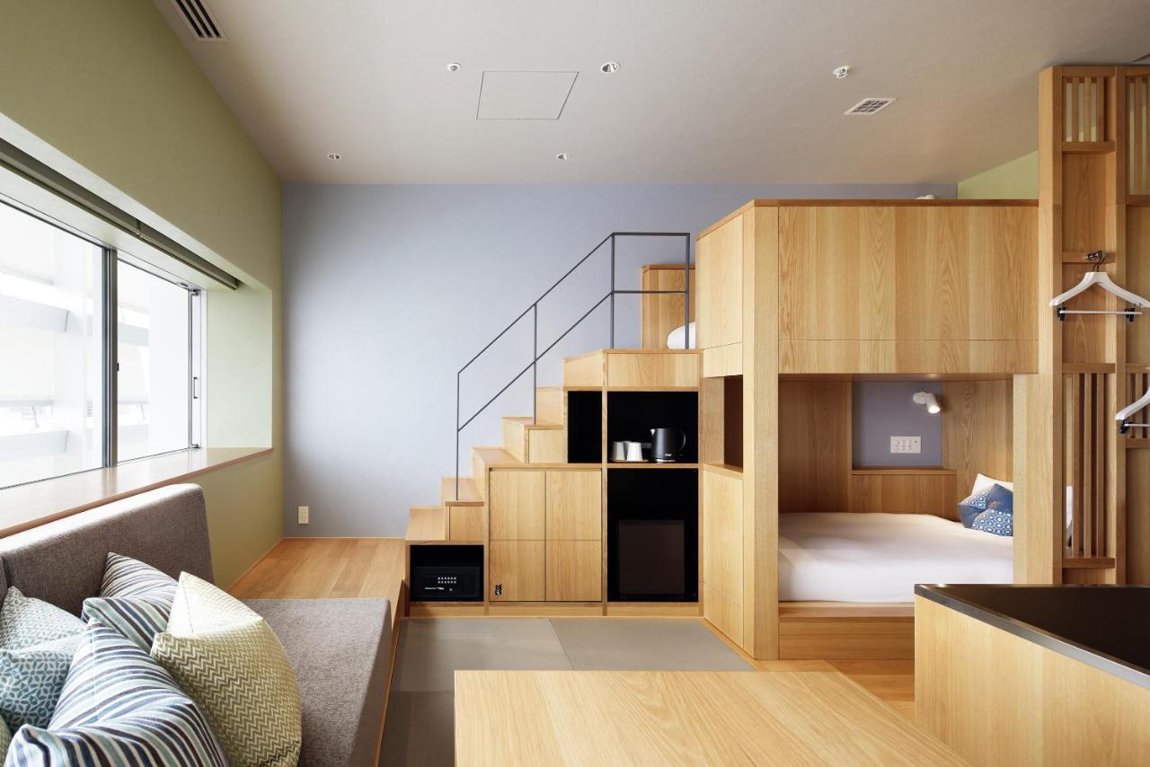 Omo7 Osaka By Hoshino Resorts Ngoại thất bức ảnh A capsule hotel room in Japan